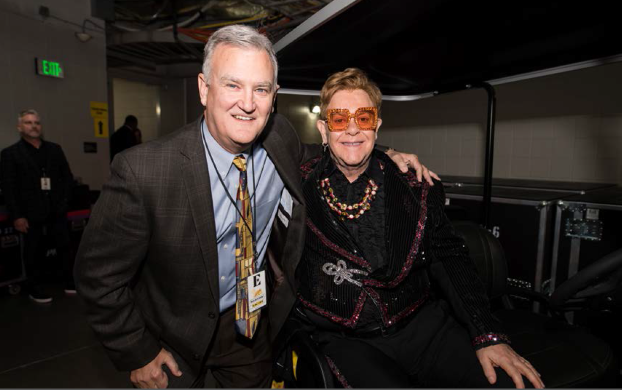 Two Yamahas One Passion: Golf-Car Company Presents Custom Cars to Elton John to Benefit AIDS Foundation